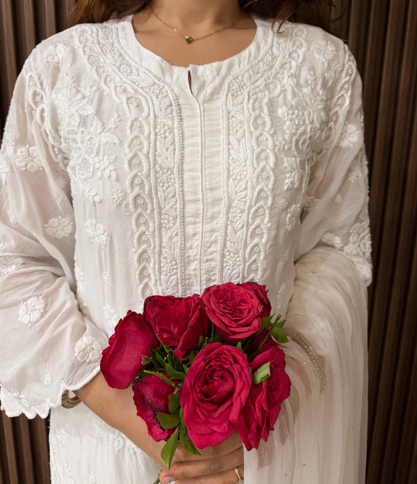 Chand Muslin Pearl & Cutdana Chikankari Suit Set.