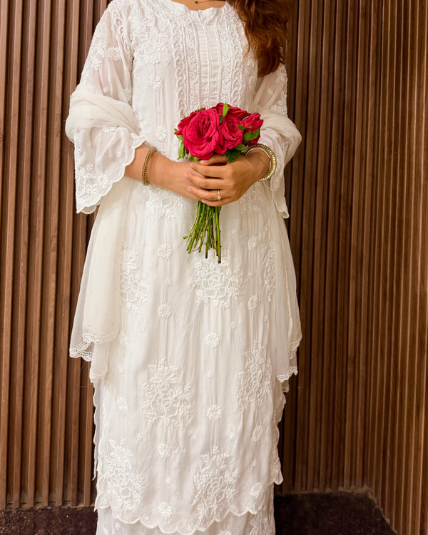 Chand Muslin Pearl & Cutdana Chikankari Suit Set.